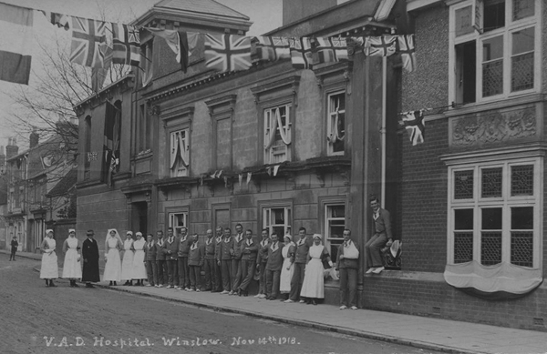The Elms decorated with flags, nurses and patients outside
